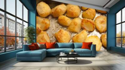 Background of delicious golden roast potatoes Wall mural