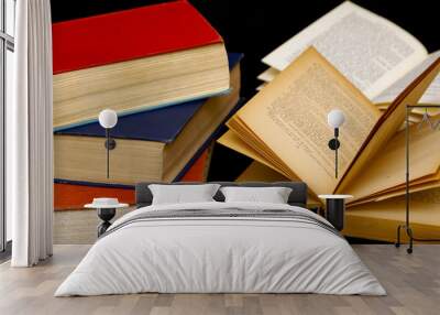 stack of three old books  two others with their pages open  Wall mural