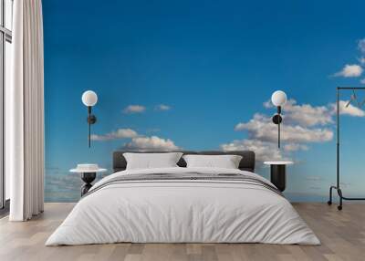 Fantastic soft clouds against blue sky, natural composition Wall mural