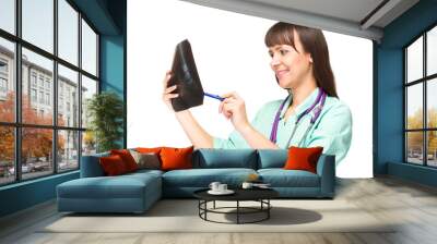 female doctor looking at the x-ray picture of foot Wall mural