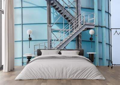 Stairs leading to the sky on a white industrial tank Wall mural