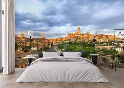 Siena sunset panoramic skyline. Mangia tower and cathedral duomo Wall mural