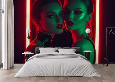 Latex fashion style portrait, two female models, neon, fashion make-up shoot. Latex bodysuit, catsuit. Goth, Emo, New Wave, Dark style fashion. Dark smokey make-up, red lipstick. Dramatic. Elegant.	 Wall mural