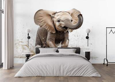 A playful young elephant splashes through water with its trunk raised, showcasing joy and energy against a white background. Wall mural