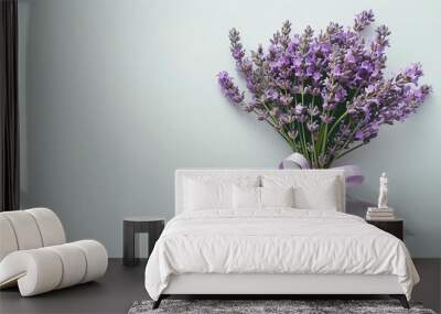 Bouquet of lavender tied with a purple ribbon on a light background fragrant and delicate floral arrangement natural and fresh Wall mural