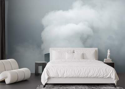 Large industrial cooling tower emitting dense white steam against a cloudy sky. Wall mural