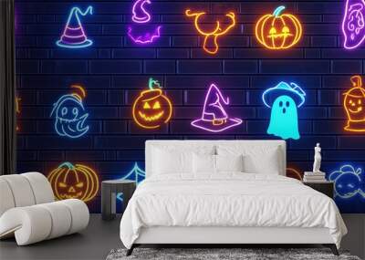 A collection of vibrant neon icons featuring pumpkins, witches' hats, and ghosts on an old brick wall background Wall mural