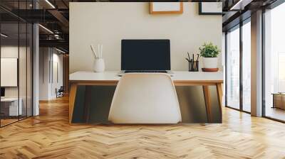 A minimalist workspace with a clean desk, a laptop, and a simple chair Wall mural