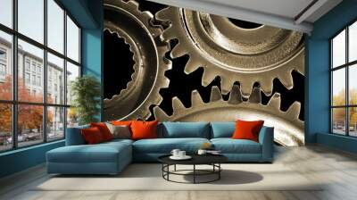 Closeup of three gears binding together Wall mural