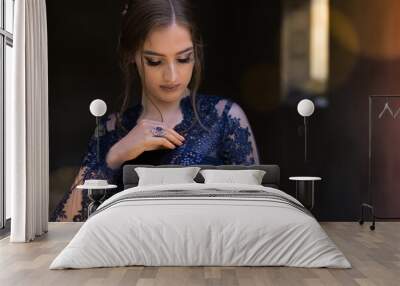 Close-up of a beautiful girl in glamorous ultramarine dress. Ready for her prom Wall mural