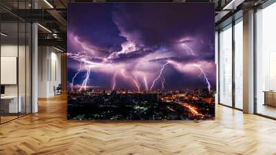 lightning storm over city in purple light Wall mural