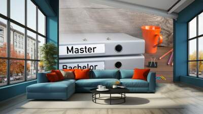 Bachelor and Master - two folders on wooden office desk. Wall mural