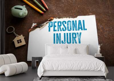 Personal Injury Claims. Burning paper with text on rusting metal background Wall mural