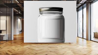 A clear glass jar with a silver lid, beautifully showcasing a blank label ready for any custom design or branding. Wall mural