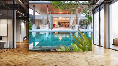 home or house building Exterior and interior design showing tropical pool villa with green garden Wall mural