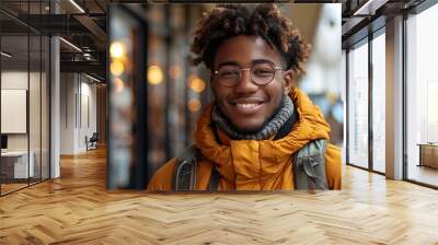 Africanamerican male student using a smartphone for online education smiling happily isolated on a transparent background highlighting learning technology and academic achievement Wall mural