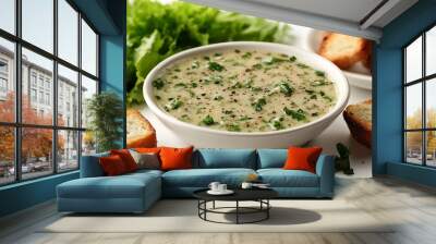 Spoonful of creamy Caesar dressing on a white background with a few croutons beside it Wall mural