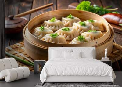 Authentic Asian gyoza dumplings in wooden bowl, steamed in bamboo steamer for dim sum or Japanese cuisine. Wall mural