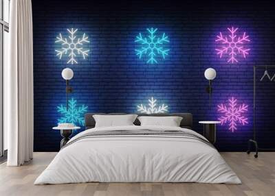 Snow icons neon. Vector glowing neon colorful snowflake icons Wall mural