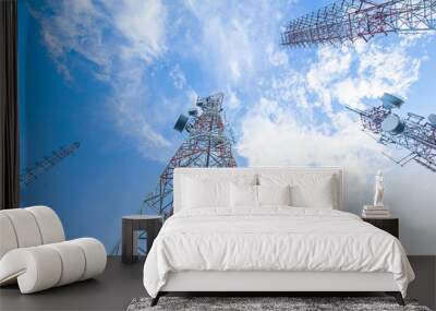 Telecommunication mast TV antennas in the afternoon ,on the hill blue sky with cloud bright at Phuket Thailand. Wall mural