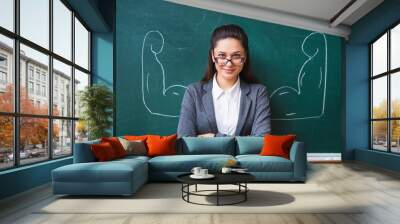 smiling teacher in the glasses near the board Wall mural