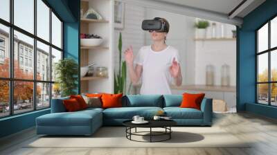 Modern Woman using VR Set while Standing in Kitchen  Wall mural