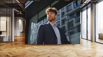 Man professional walking downtown in suit closeup. Confident ceo going street Wall mural