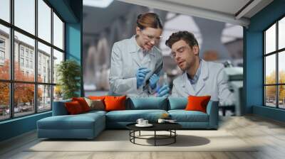 Medical workers worried research disease treatment in modern laboratory close up Wall mural