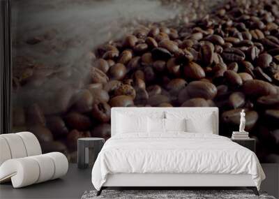 Steam coming coffee beans close up. Aromatic seeds roasting in super slow motion Wall mural