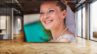 Portrait of the bride sitting in the car Wall mural