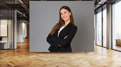 young businesswoman posing instudio background Wall mural