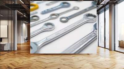 Wrenches and tools neatly arranged on a white background hardware and mechanic essentials. Generative AI Wall mural