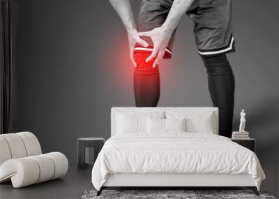 Man and knee pain Wall mural