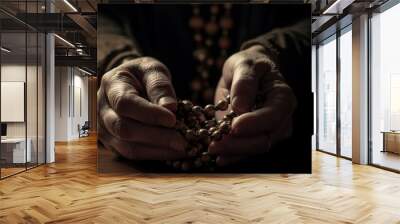 A man holding rosary beads praying for spirituality and religion generated by AI Wall mural