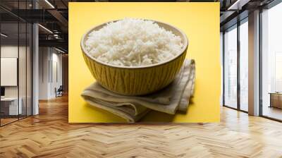 basmati rice in a ceramic bowl, indian white and long basmati rice cooked and served in bowl, selective focus Wall mural