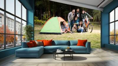 Group Of Asian Indian young Friends Relaxing Outside Tents On Camping Holiday. Wall mural