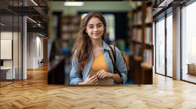 Indian female college student or university girl student with books and bag Wall mural