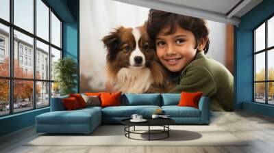 Indian kid playing with pet dog Wall mural