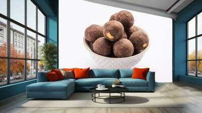 Nachni laddu or Ragi laddoo or sweet balls made using finger millet, jaggery and ghee Wall mural