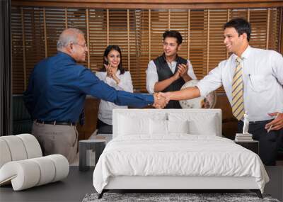 Welcome to board! Indian Business people shaking hands, finishing up a meeting Wall mural