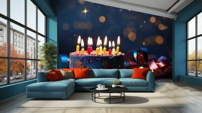 A beautiful holiday image with lit candles and festive decorations is a copy space for happy birthday greetings to a 10 year old child Wall mural