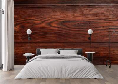 Aged scratched mahogany plank with a dark brown wood texture serves as a copy space image Wall mural