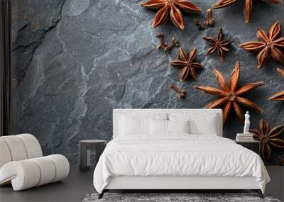 Closeup of star anise spice on a gray stone background with room for text around the image. with copyspace image Wall mural