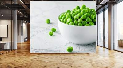 Fresh and healthy green peas in a bowl on a white backdrop with room for text or graphics. with copyspace image Wall mural