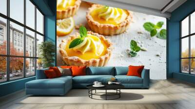 Homemade lemon tartlets on a white and grey concrete backdrop with a copy space image. Wall mural