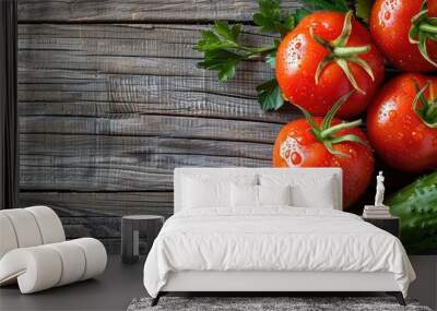 Image of organic red tomatoes and cucumber on a wooden backdrop with copy space. Wall mural