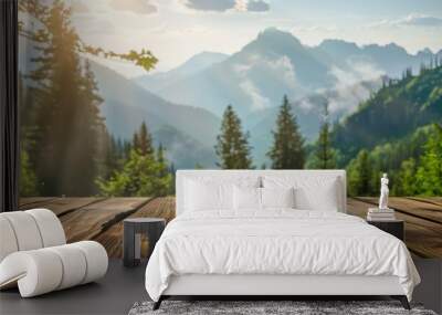 Wooden table with a mountain and green nature blur in the background offering a copy space image on the table for showcasing products with a forest scenery backdrop Wall mural