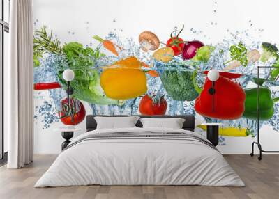 fresh vegetables splashing into blue clear water splash healthy food diet freshness concept isolated white background Wall mural