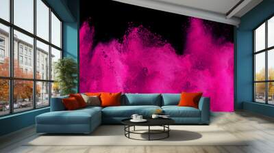 pink magenta holi paint color powder explosion isolated  dark black background. industry beautiful party festival concept Wall mural