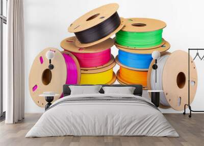 stack pile of colorful  3d printing filament PLA material on environmentally friendly and recyclable paper cardboard spools isolated white background. modern FDM printer technology concept Wall mural